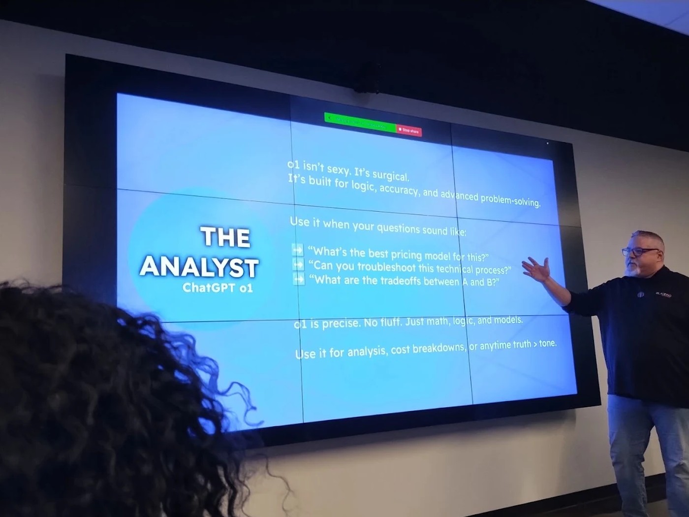 Harrison Painter teaching a team training session in a conference room